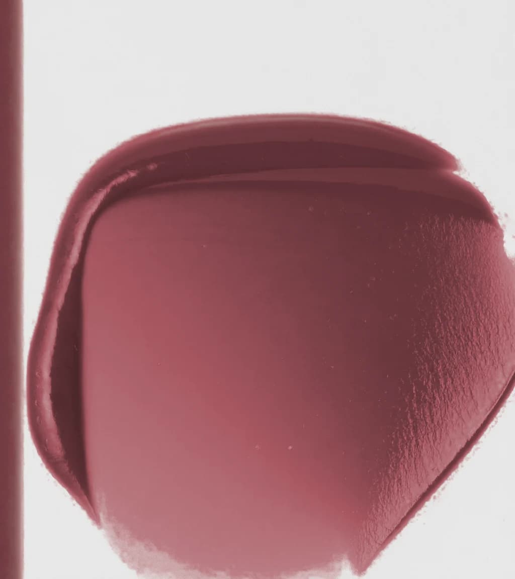 Macro de la textura mate del labial en teddy tint